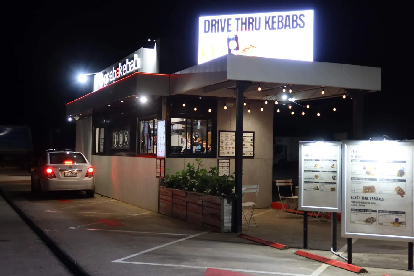 Ordering at the Grab A Kebab drive-thru window at night